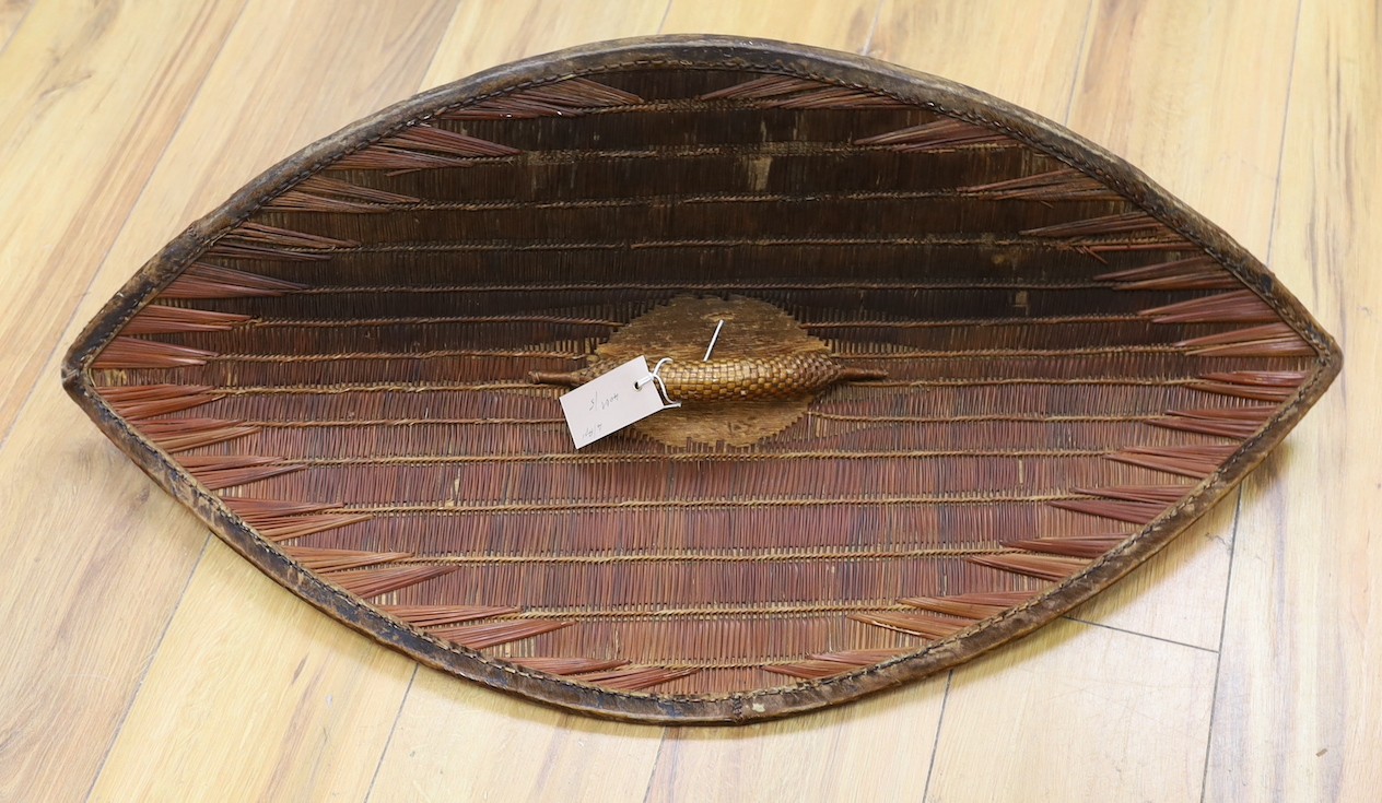 A Ugandan wicker shield, Soga or Ganda, 83cm